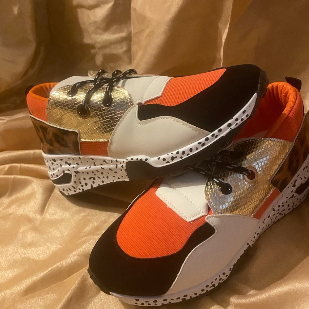 Size 9 in women sneakers no brand color gold ,black ,brown , white and orange